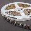 RGB LED pásek 14,4W 300SMD vnitřní kotouč černý podklad vypnutý RGB LED pásek 14,4W 300SMD vnitřní kotouč černý podklad vypnutý